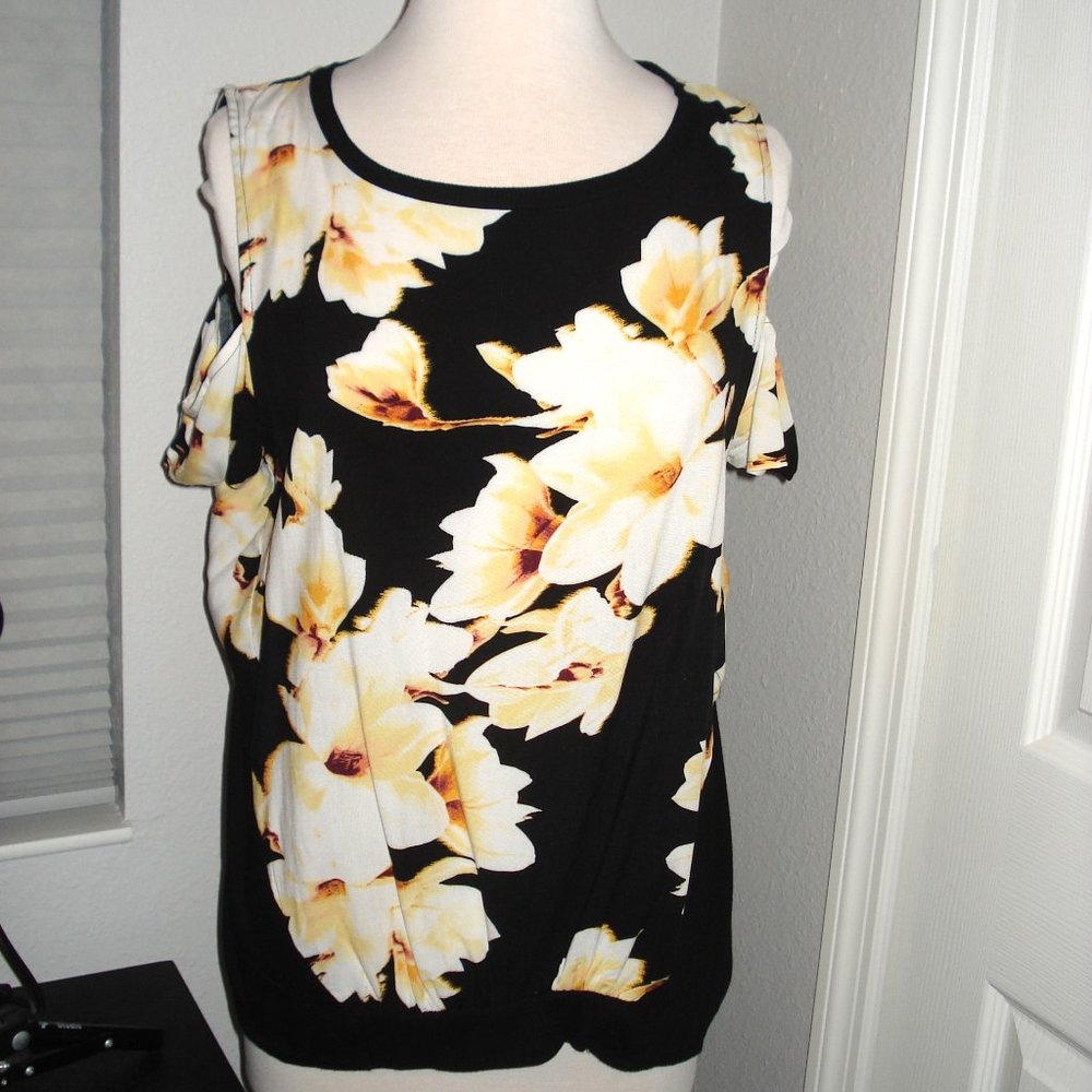 Juicy Couture Peekaboo Sleeve Top with Black underlining and Flowered Overlay